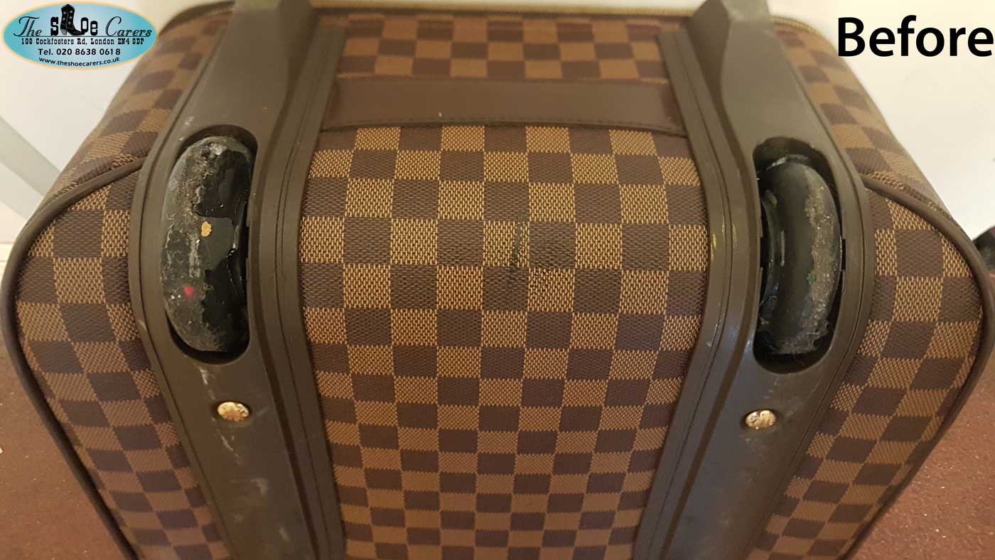 Louis Vuitton suitcase wheel re-rubbering – The Shoe Carers